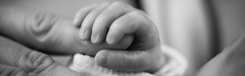 Baby holding mom's finger | Hypnobirthing Classes Tampa, FL | Childbirth Classes